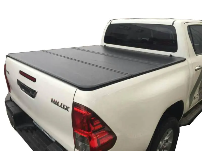 [2160] Tapa rigida tres paños - TCR Toyota Hilux 2016+